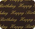 A HAPPY BIRTHDAY CLASSIC mousepad with gold lettering on a black background.