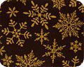 A brown and gold SNOWFLAKE 2 coaster with SNOWFLAKE 2 on it.
