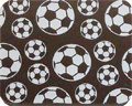 A brown and white SOCCER BALLS WHITE 10" X 11" shaped coaster.