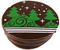 A chocolate dessert with the WINTER TREES WHITE/GREEN COOKIE TRANSFER on it.