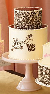 717 Three tiers of wedding cakes with the word love on them.
