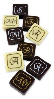 A set of chocolate squares with the letters a, b, c, d and e.