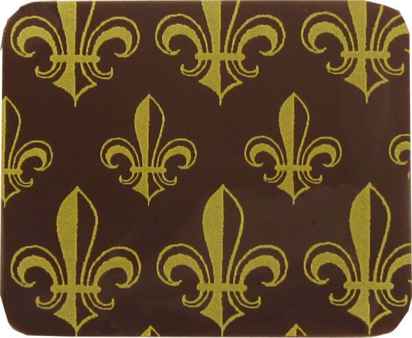 A brown and gold square plate with fleur de lis on it.