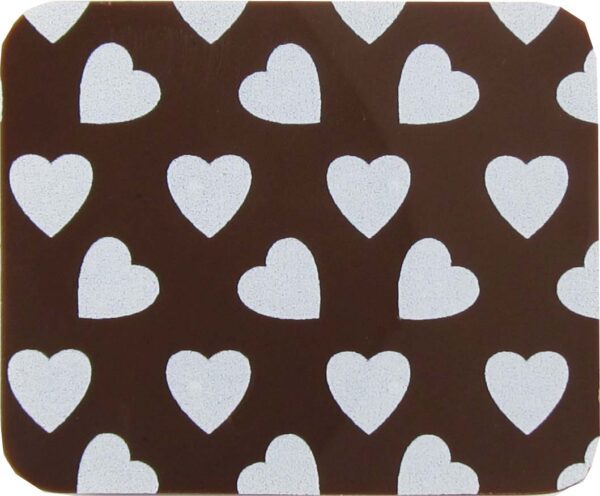 A brown and white heart shaped coaster.