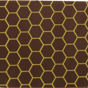 A brown and yellow coaster with a honeycomb pattern.