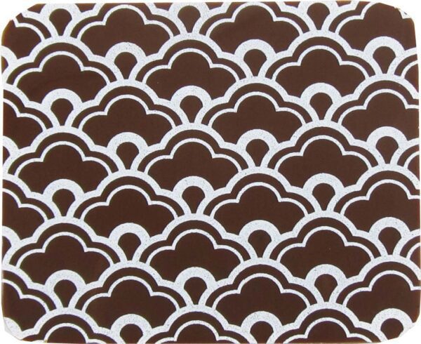 A brown and white coaster with a wave pattern.
