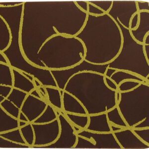 A brown and yellow coaster with swirls on it.