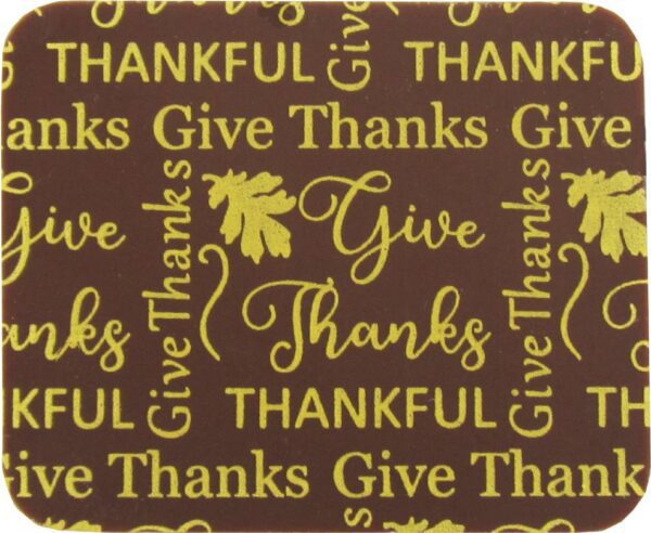 A brown and gold coaster with the words Give Thanks thanksgiving.