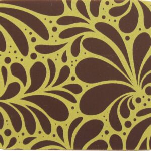 A Splendor brown and yellow coaster with a floral pattern.