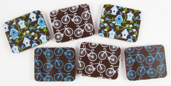 A set of chocolate coasters with bicycles on them.