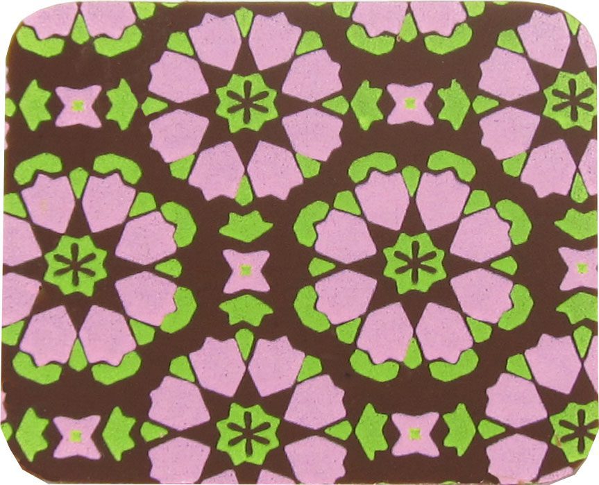 A pink and green coaster with a floral pattern.