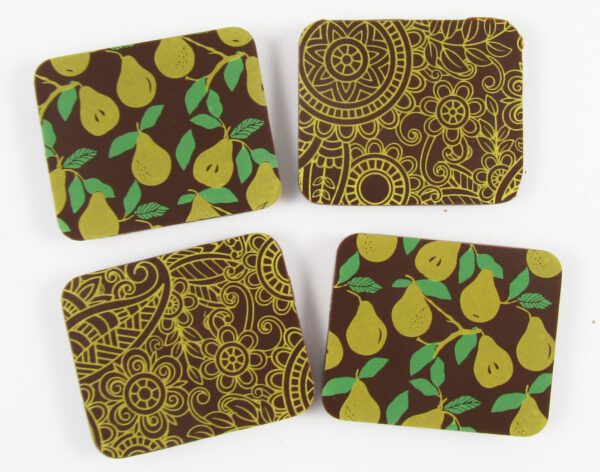 Four brown and green coasters with pears on them.