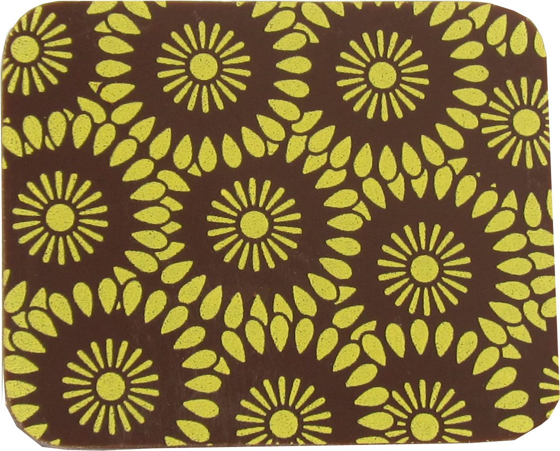 A brown and yellow square coaster with flowers on it.