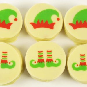 Round white chocolates decorated with elf motifs