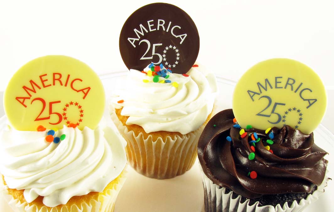 Three cupcakes with America 250 toppers